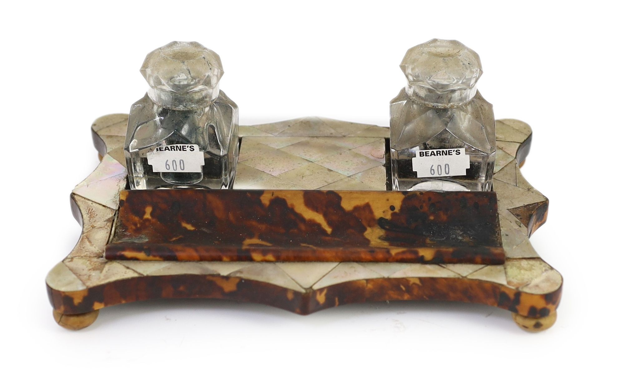 A Victorian tortoiseshell and mother of pearl inkstand, 21cm wide